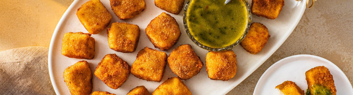 Air Fryer Crispy Cheese Bites with Cilantro-Jalapeño Chimichurri - CTown Supermarkets